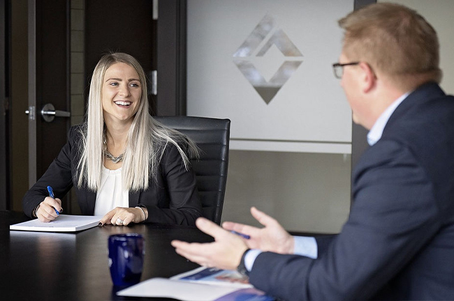 image of woman and man in Virtus Group boardroom